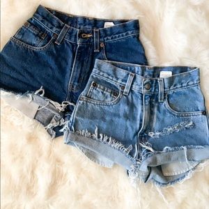 Pair of high waisted Levi cut offs 550/570